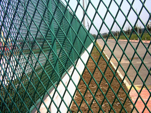 Expanded metal mesh fencing